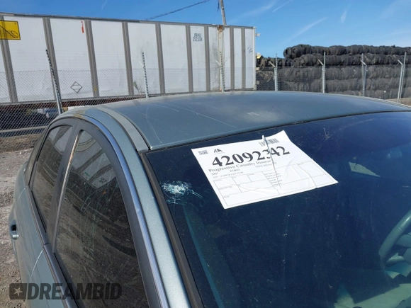 2007 Ford Five Hundred SEL with VIN 1FAFP24157G112188, listed as a IAAI auction lot 42092342 with 71,396 mi miles. Bid and sale history available at carsss.com. Image 13.