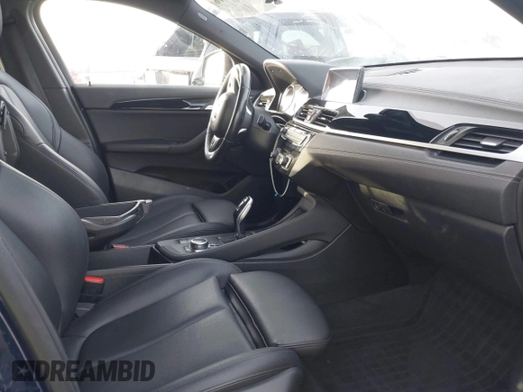 2020 BMW X2 sDrive28i with VIN WBXYH9C02L5P01502, listed as a IAAI auction lot 41397416 with 82,660 mi miles. Bid and sale history available at carsss.com. Image 8.