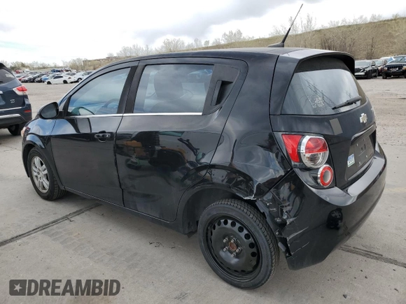 2012 Chevrolet Sonic LT with VIN 1G1JC6SB7C4200604, listed as a Copart auction lot 52843945 with 101,039 mi miles and Salvage Title. Bid and sale history available at carsss.com. Image 2.