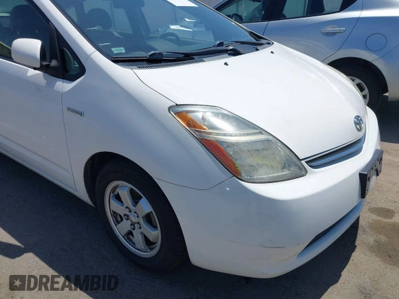 2008 Toyota Prius z VIN JTDKB20U183323310, wystawiony jako IAAI lot #42433329 z przebiegiem 140 100 mil mil oraz . Historia ofert i sprzedaży dostępna na DreamBid. Obrazek 18.