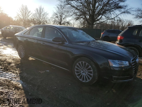2015 Audi A8 z VIN WAUJGAFD4FN028750, wystawiony jako Copart lot #89099265 z przebiegiem 44 149 mil mil oraz Szkoda całkowita • Salvage title. Historia ofert i sprzedaży dostępna na DreamBid. Obrazek 4.