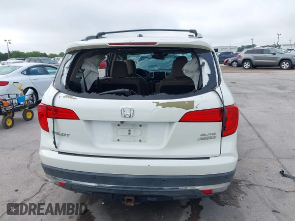 2016 Honda Pilot Elite with VIN 5FNYF6H00GB104329, listed as a IAAI auction lot 41905390 with 125,501 mi miles. Bid and sale history available at carsss.com. Image 16.