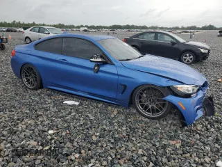 2014 BMW 4 Series 435i xDrive with VIN WBA3R5C50EK187272, listed as a Copart auction lot 56579855 with 129,873 mi miles and Salvage title. Bid and sale history available at DreamBid. Image 4.
