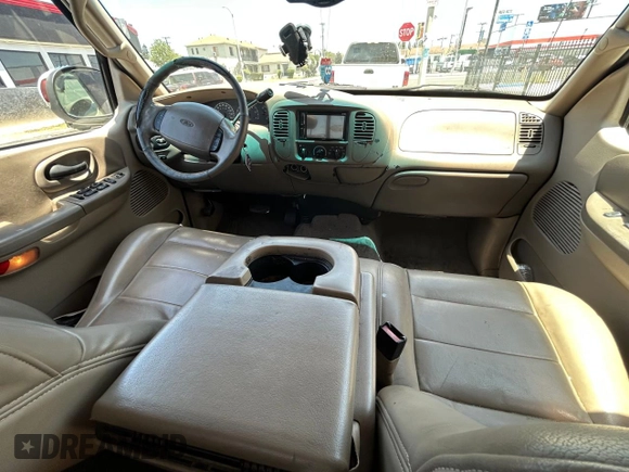2001 Ford F-150 XLT с VIN 1FTRW07L11KF90642, выставлен на аукционе Copart как лот 64489205 с пробегом 242 959 миль миль и Списание • Salvage title. История ставок и продаж доступна на DreamBid. Изображение 9.
