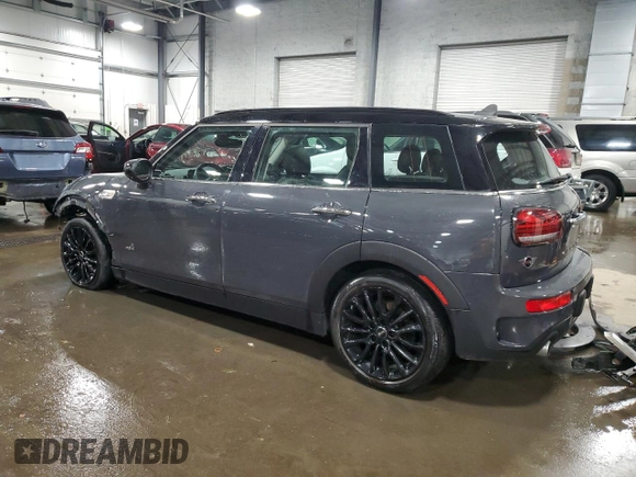 2021 MINI Clubman Cooper S with VIN WMWXJ1C05M2P49901, listed as a Copart auction lot 83023554 with 49,357 mi miles and Salvage Title. Bid and sale history available at carsss.com. Image 2.