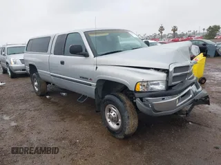 2000 Dodge Ram 2500 with VIN 1B7KF23W0YJ126951, listed as a IAAI auction lot 41802970 with 179,644 mi miles. Bid and sale history available at carsss.com. Image 1.