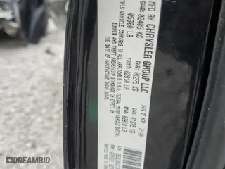 2010 Dodge Charger R/T with VIN 2B3CA5CT3AH172325, listed as a Copart auction lot 50302885 with 257,870 mi miles and Salvage Title. Bid and sale history available at carsss.com. Image 12.