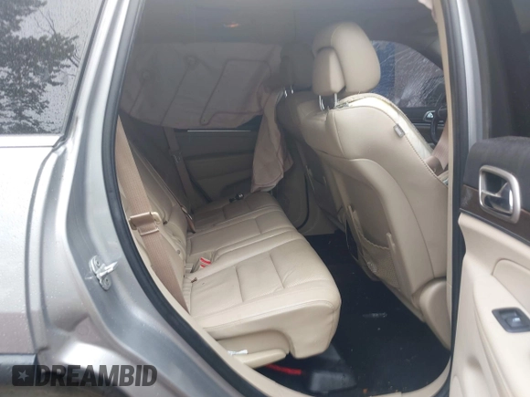 2014 Jeep Grand Cherokee Limited with VIN 1C4RJFBT1EC200888, listed as a IAAI auction lot 42435488 with 117,691 mi miles and . Bid and sale history available at DreamBid. Image 8.
