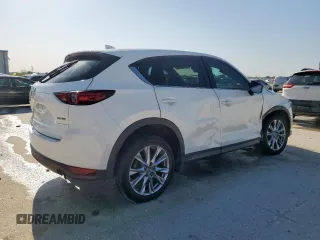 2020 Mazda CX-5 Grand Touring with VIN JM3KFADM7L0804219, listed as a Copart auction lot 51982225 with 56,356 mi miles and Salvage Title. Bid and sale history available at carsss.com. Image 3.