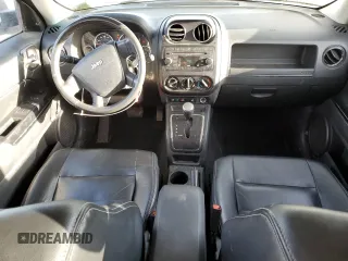 2009 Jeep Patriot with VIN 1J8FF48B49D221606, listed as a Copart auction lot 49596465 with 168,305 mi miles and Salvage title. Bid and sale history available at DreamBid. Image 8.