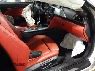 2015 BMW 4 Series 428i xDrive z VIN WBA3N9C52FK246245, wystawiony jako IAAI lot #41650714 z przebiegiem 142 776 mil mil oraz . Historia ofert i sprzedaży dostępna na DreamBid. Obrazek 5.