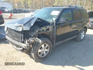 2012 Ford Escape Limited with VIN 1FMCU9EG8CKC55186, listed as a IAAI auction lot 41972829 with 164,466 mi miles. Bid and sale history available at carsss.com. Image 2.