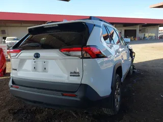 2023 Toyota RAV4 Hybrid XLE with VIN 2T3UWRFV1PW154391, listed as a IAAI auction lot 41302404 with 86,579 mi miles. Bid and sale history available at carsss.com. Image 4.