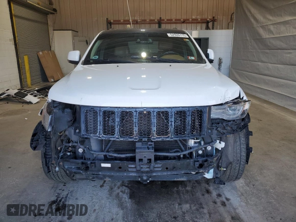 2015 Jeep Grand Cherokee Summit with VIN 1C4RJFJG1FC226591, listed as a Copart auction lot 52926115 with 130,803 mi miles and Salvage Title. Bid and sale history available at DreamBid. Image 5.