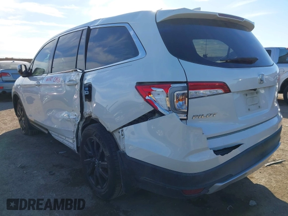 2019 Honda Pilot EX-L with VIN 5FNYF5H59KB017415, listed as a IAAI auction lot 41340852 with 125,433 mi miles and . Bid and sale history available at DreamBid. Image 3.