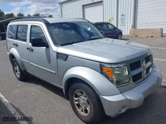 2011 Dodge Nitro SE with VIN 1D4PU2GKXBW508467, listed as a IAAI auction lot 42061484 with 100,295 mi miles. Bid and sale history available at carsss.com. Image 1.