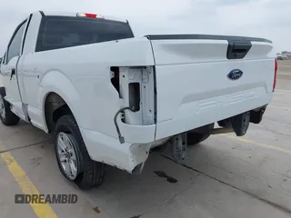2018 Ford F-150 XL with VIN 1FTMF1CB4JKF54148, listed as a IAAI auction lot 42275439 with 157,811 mi miles and . Bid and sale history available at DreamBid. Image 19.
