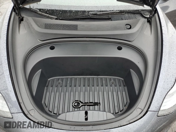 2023 Tesla Model 3 with VIN 5YJ3E1EA2PF708297, listed as a Copart auction lot 47982675 with 16,246 mi miles and Salvage title. Bid and sale history available at DreamBid. Image 13.