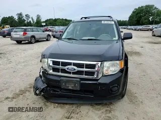 2012 Ford Escape XLS with VIN 1FMCU9C71CKA30319, listed as a Copart auction lot 60189745 with 214,736 mi miles and Salvage title. Bid and sale history available at DreamBid. Image 14.