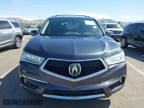 2019 Acura MDX Technology with VIN 5J8YD4H5XKL029023, listed as a IAAI auction lot 42108214 with 73,535 mi miles and . Bid and sale history available at DreamBid. Image 12.