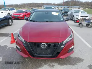 2021 Nissan Altima SR with VIN 1N4BL4CV9MN410163, listed as a IAAI auction lot 41856325 with 56,903 mi miles and . Bid and sale history available at carsss.com. Image 12.