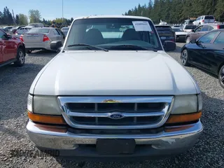 1999 Ford Ranger XLT with VIN 1FTYR14X0XPA65325, listed as a IAAI auction lot 42009611 with 218,657 mi miles. Bid and sale history available at carsss.com. Image 13.