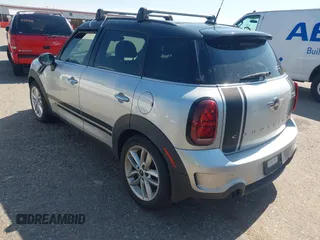 2014 MINI Countryman S with VIN WMWZC5C52EWP36667, listed as a IAAI auction lot 42541120 with 149,331 mi miles and . Bid and sale history available at DreamBid. Image 3.