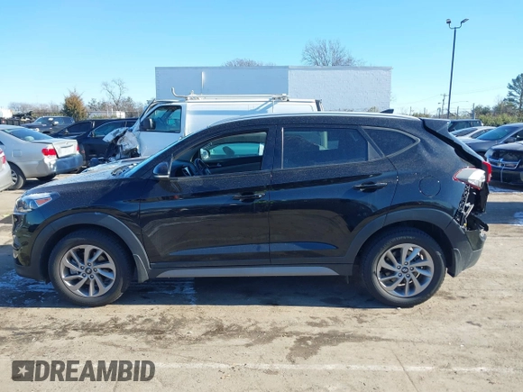 2017 Hyundai Tucson SE Plus with VIN KM8J33A49HU381233, listed as a IAAI auction lot 41393645 with 83,708 mi miles. Bid and sale history available at carsss.com. Image 14.