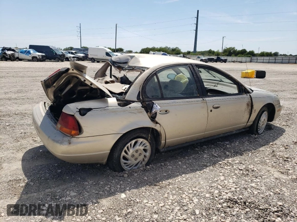 1998 Saturn SL z VIN 1G8ZK5271WZ265579, wystawiony jako Copart lot #68153934 z przebiegiem Nie podano mil oraz Szkoda całkowita • Salvage title. Historia ofert i sprzedaży dostępna na DreamBid. Obrazek 3.