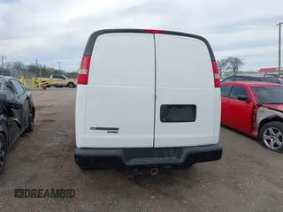 2014 Chevrolet Express Cargo Van with VIN 1GCWGGCA4E1209164, listed as a IAAI auction lot 41838141 with 174,770 mi miles. Bid and sale history available at carsss.com. Image 16.