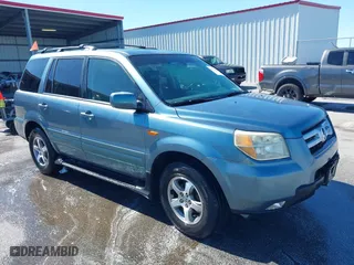 2006 Honda Pilot EX-L with VIN 5FNYF28586B004479, listed as a IAAI auction lot 41759406 with 301,087 mi miles. Bid and sale history available at carsss.com. Image 1.