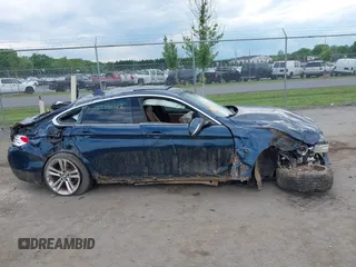 2016 BMW 4 Series 428i with VIN WBA4A9C52GGL88003, listed as a IAAI auction lot 42225642 with 105,054 mi miles and . Bid and sale history available at DreamBid. Image 13.