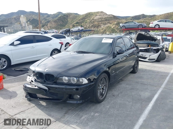 2001 BMW M5 z VIN WBSDE93421BZ99483, wystawiony jako IAAI lot #41892842 z przebiegiem 134 689 mil mil oraz . Historia ofert i sprzedaży dostępna na DreamBid. Obrazek 21.
