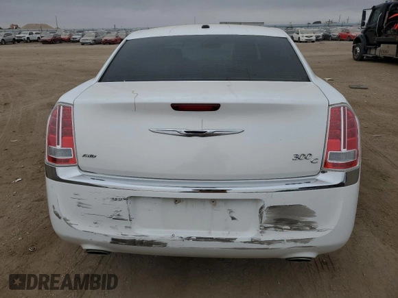 2012 Chrysler 300 C with VIN 2C3CCAKT3CH143367, listed as a Copart auction lot 43193155 with 126,132 mi miles and Salvage Title. Bid and sale history available at DreamBid. Image 6.