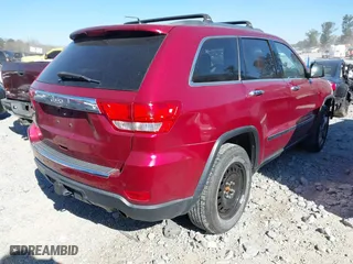 2012 Jeep Grand Cherokee Overland with VIN 1C4RJFCG1CC249135, listed as a IAAI auction lot 41840241 with 150,433 mi miles. Bid and sale history available at carsss.com. Image 4.