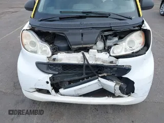 2008 Smart fortwo Pure z VIN WMEEJ31X18K126191, wystawiony jako IAAI lot #42045070 z przebiegiem 149 361 mil mil oraz . Historia ofert i sprzedaży dostępna na DreamBid. Obrazek 6.