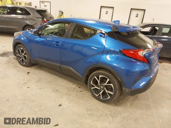 2019 Toyota C-HR XLE with VIN JTNKHMBX0K1042342, listed as a IAAI auction lot 41935879 with 54,190 mi miles and . Bid and sale history available at DreamBid. Image 3.