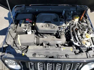 2023 Jeep Wrangler Sahara z VIN 1C4JJXP66PW605961, wystawiony jako Copart lot #50209655 z przebiegiem 32 805 mil mil oraz Szkoda całkowita • Salvage title. Historia ofert i sprzedaży dostępna na DreamBid. Obrazek 12.
