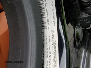 2015 Maserati Ghibli z VIN ZAM57XSA7F1148872, wystawiony jako Copart lot #48454165 z przebiegiem 72 232 mil mil oraz Szkoda całkowita • Salvage title. Historia ofert i sprzedaży dostępna na DreamBid. Obrazek 13.