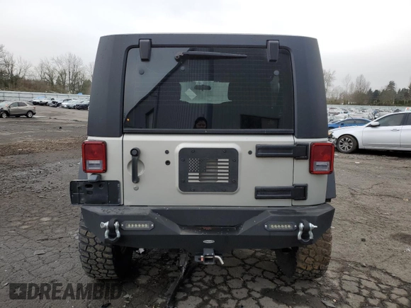 2007 Jeep Wrangler Unlimited X with VIN 1J4GA39177L105582, listed as a Copart auction lot 88912935 with 156,156 mi miles and Salvage Title. Bid and sale history available at DreamBid. Image 6.