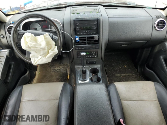 2007 Ford Explorer Sport Trac Limited с VIN 1FMEU33897UA12983, выставлен на аукционе Copart как лот 54707045 с пробегом 270 420 миль миль и Списание • Salvage title. История ставок и продаж доступна на DreamBid. Изображение 8.