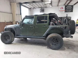 2007 Jeep Wrangler X z VIN 1J4GA39107L132865, wystawiony jako IAAI lot #42252972 z przebiegiem 101 114 mil mil oraz . Historia ofert i sprzedaży dostępna na DreamBid. Obrazek 15.