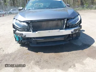 2020 Honda Civic Si z VIN 2HGFC1E53LH704576, wystawiony jako IAAI lot #41979301 z przebiegiem 59 245 mil mil oraz . Historia ofert i sprzedaży dostępna na DreamBid. Obrazek 6.