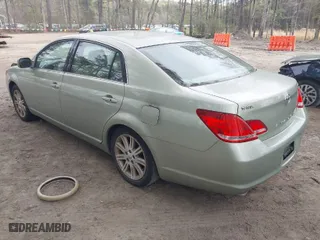 2005 Toyota Avalon XL with VIN 4T1BK36B55U033424, listed as a IAAI auction lot 41954652 with 231,640 mi miles. Bid and sale history available at carsss.com. Image 3.