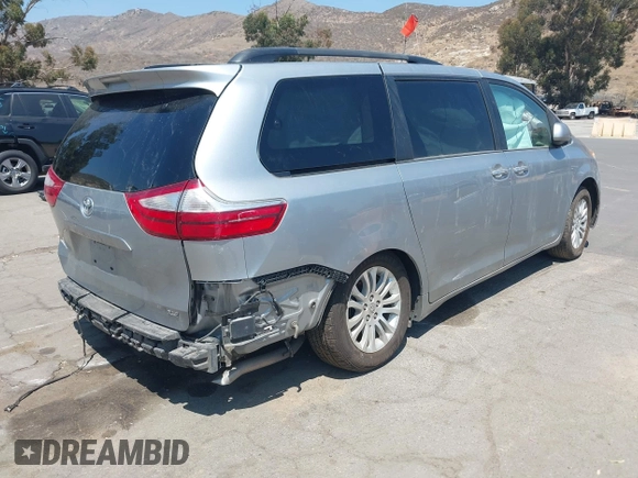 2015 Toyota Sienna XLE with VIN 5TDYK3DC0FS589947, listed as a IAAI auction lot 36567379 with 130,969 mi miles and . Bid and sale history available at DreamBid. Image 4.