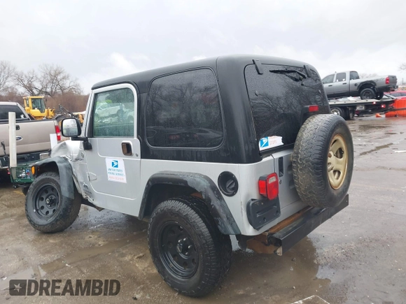 2006 Jeep Wrangler Sport Right Hand Drive with VIN 1J4F449SX6P764491, listed as a IAAI auction lot 41709726 with 290,798 mi miles. Bid and sale history available at carsss.com. Image 3.