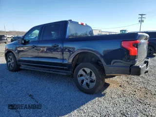 2024 Ford F-150 Lightning XLT with VIN 1FTVW3LK1RWG18473, listed as a Copart auction lot 86523084 with 6,824 mi miles and Salvage title. Bid and sale history available at DreamBid. Image 2.