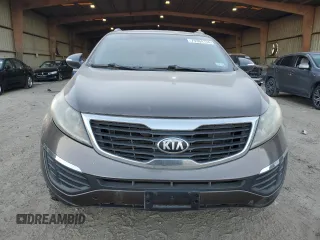 2013 Kia Sportage LX z VIN KNDPB3A23D7465413, wystawiony jako Copart lot #79964134 z przebiegiem 122 467 mil mil oraz Szkoda całkowita • Salvage title. Historia ofert i sprzedaży dostępna na DreamBid. Obrazek 5.
