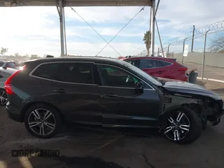 2019 Volvo XC60 Momentum with VIN LYV102RKXKB196748, listed as a IAAI auction lot 41261328 with 74,925 mi miles and . Bid and sale history available at DreamBid. Image 14.