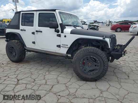 2015 Jeep Wrangler Unlimited Sport с VIN 1C4BJWDG3FL570131, выставлен на аукционе Copart как лот 64418415 с пробегом 112 362 миль миль и Списание • Salvage title. История ставок и продаж доступна на DreamBid. Изображение 4.